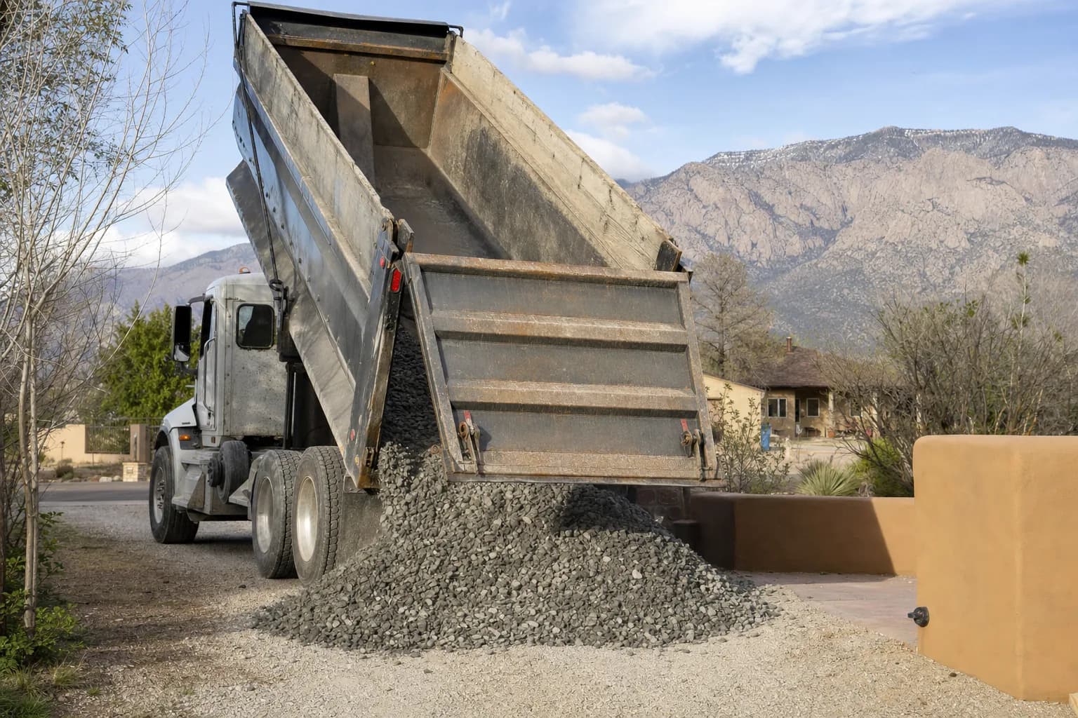 Freshly laid gravel driveway at a residential property